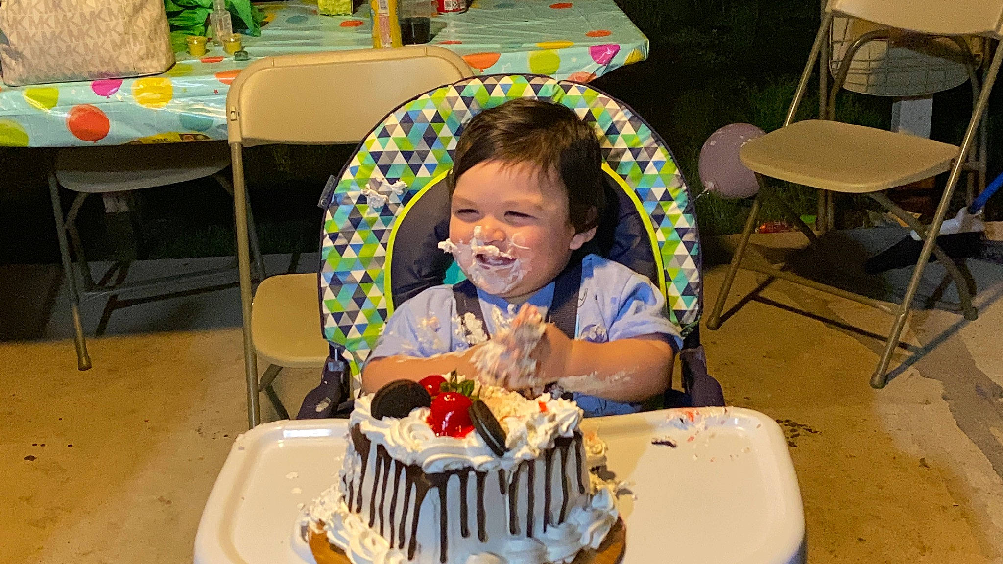 Matthew is registered to the contest to win money with this photo: baked_goods, birthday, birthday_cake, cake, cake_decorating, cake_decorating_supply, chair, dessert, event, food, furniture, leisure, person, plate, sharing, smile, sugar_cake, sugar_paste, table, tableware
