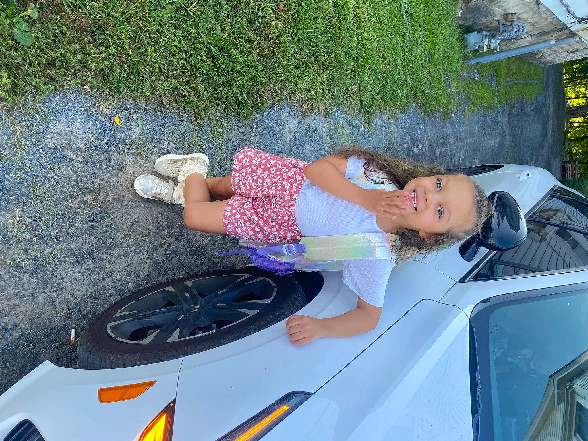 Khloe joined the competition — help win amazing prizes! automotive_design, automotive_exterior, automotive_lighting, automotive_tire, automotive_wheel_system, bumper, car, fender, fun, hood, joy, leisure, motor_vehicle, person, personal_luxury_car, recreation, smile, sunglasses, tire, vehicle