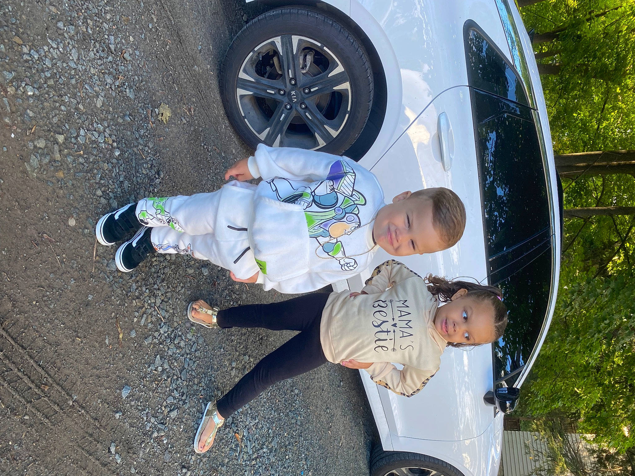 Kyler joined the competition — help win amazing prizes! alloy_wheel, automotive_design, automotive_exterior, automotive_lighting, automotive_tire, car, fender, hood, hubcap, joy, motor_vehicle, person, plant, rim, shoe, sneakers, tire, toddler, tree, vehicle