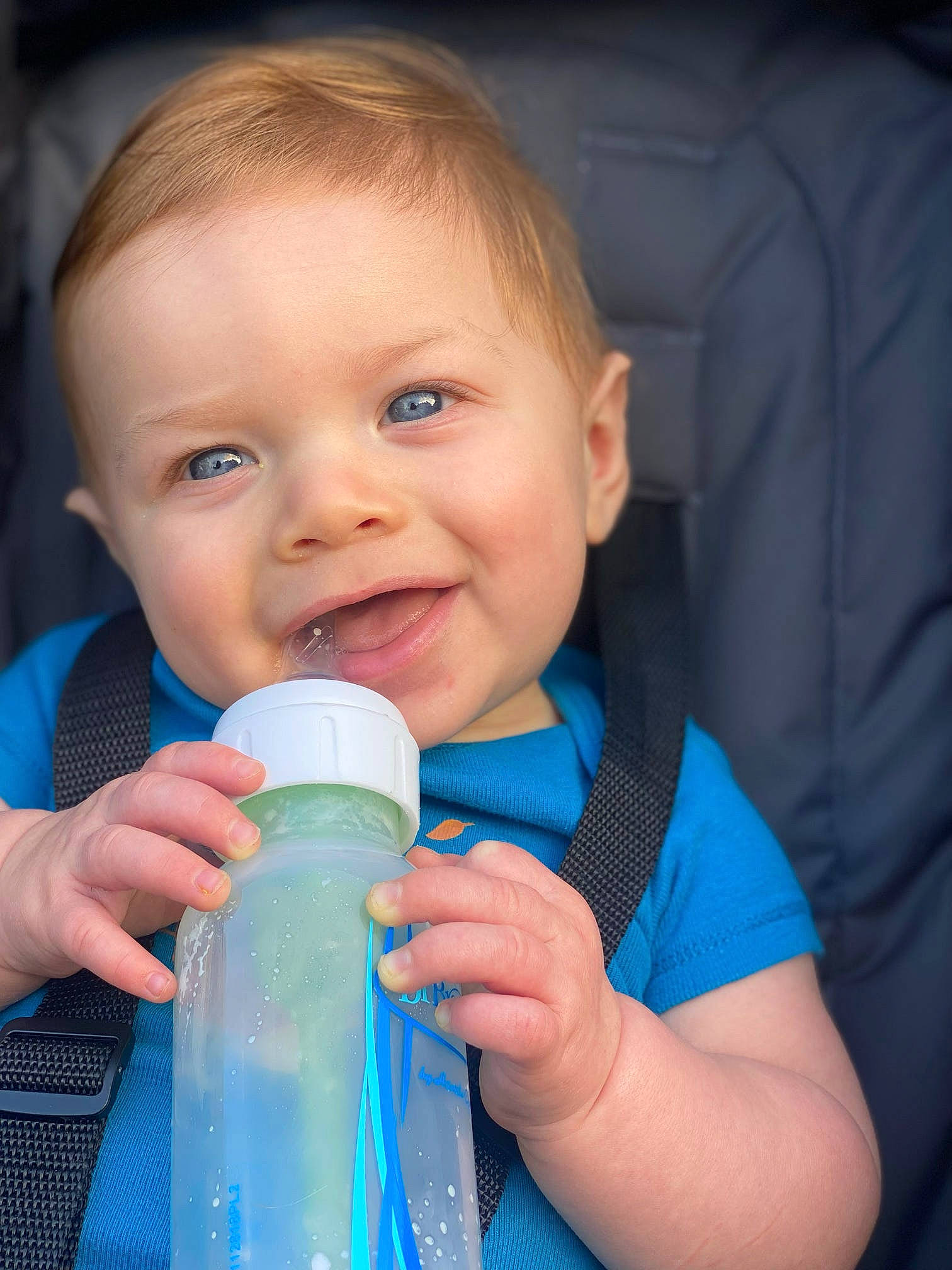 Declan joined the competition — help win amazing prizes! baby, baby_bottle, baby_products, baby_toddler_clothing, cheek, child, drinking, drinkware, finger, fun, gesture, hand, happy, joy, nail, nose, person, plastic_bottle, skin, smile