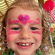 Kamellia a rejoint le concours — aidez-le/la à gagner de superbes lots ! child, face_paint, glitter, smile, curly_hair, green_sweater, balloons, outdoor, portrait, happy, teeth, close_up, festive, party, wooden_structure, pink, sparkle, cute, celebration, person