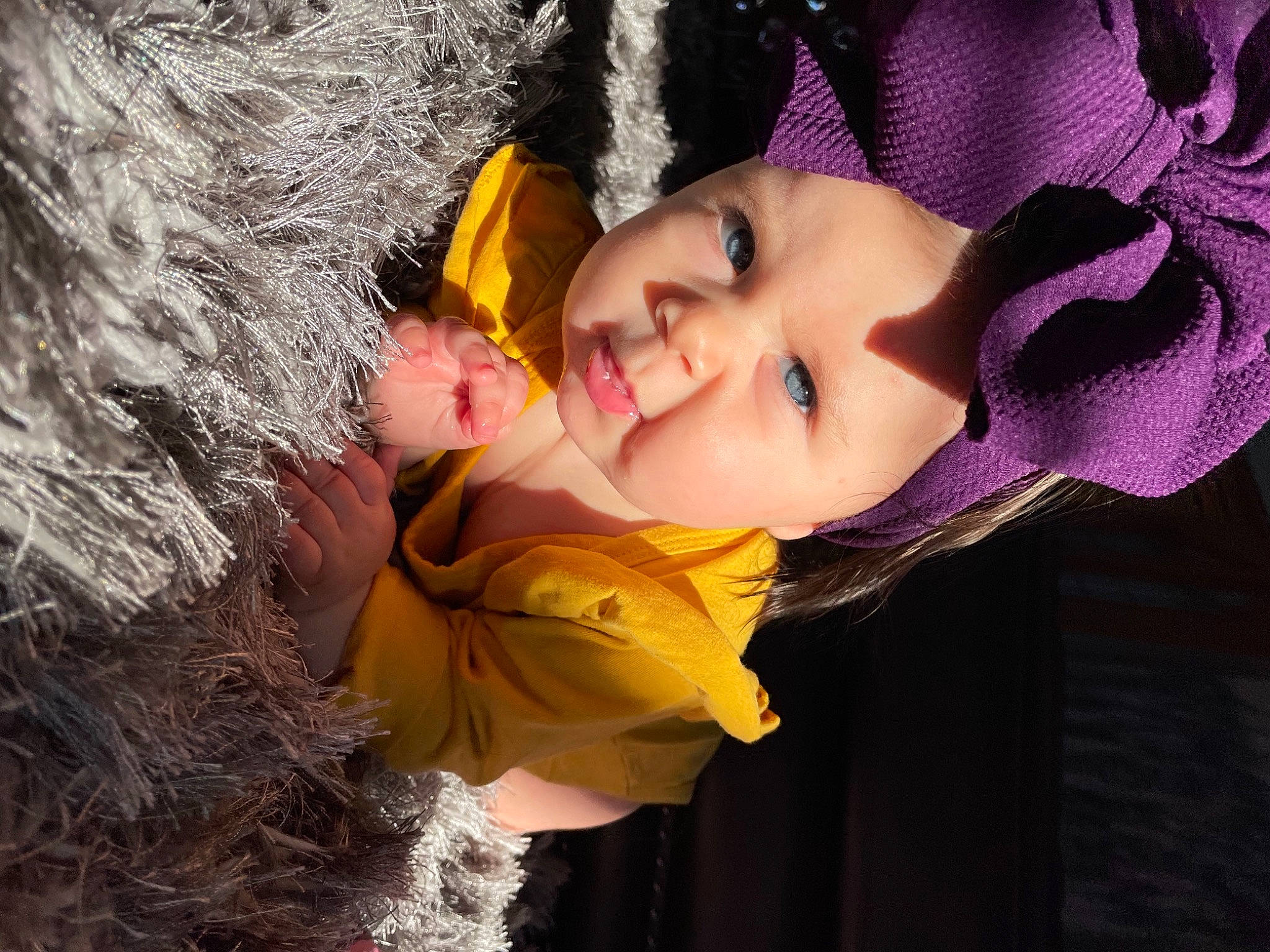 Elaine joined the competition — help win amazing prizes! animal_product, baby, cheek, costume, costume_accessory, costume_hat, fur, fur_clothing, glove, hair_accessory, happy, headgear, love, natural_material, people_in_nature, person, purple, textile, violet