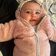 Sydney joined the competition — help win amazing prizes! baby, infant, baby_girl, pink_jacket, headband, closeup, portrait, big_eyes, smile, rosy_cheeks, eyelashes, zipper, faux_fur, cozy, blanket, bed, lying_down, skin, cute, warm_clothing