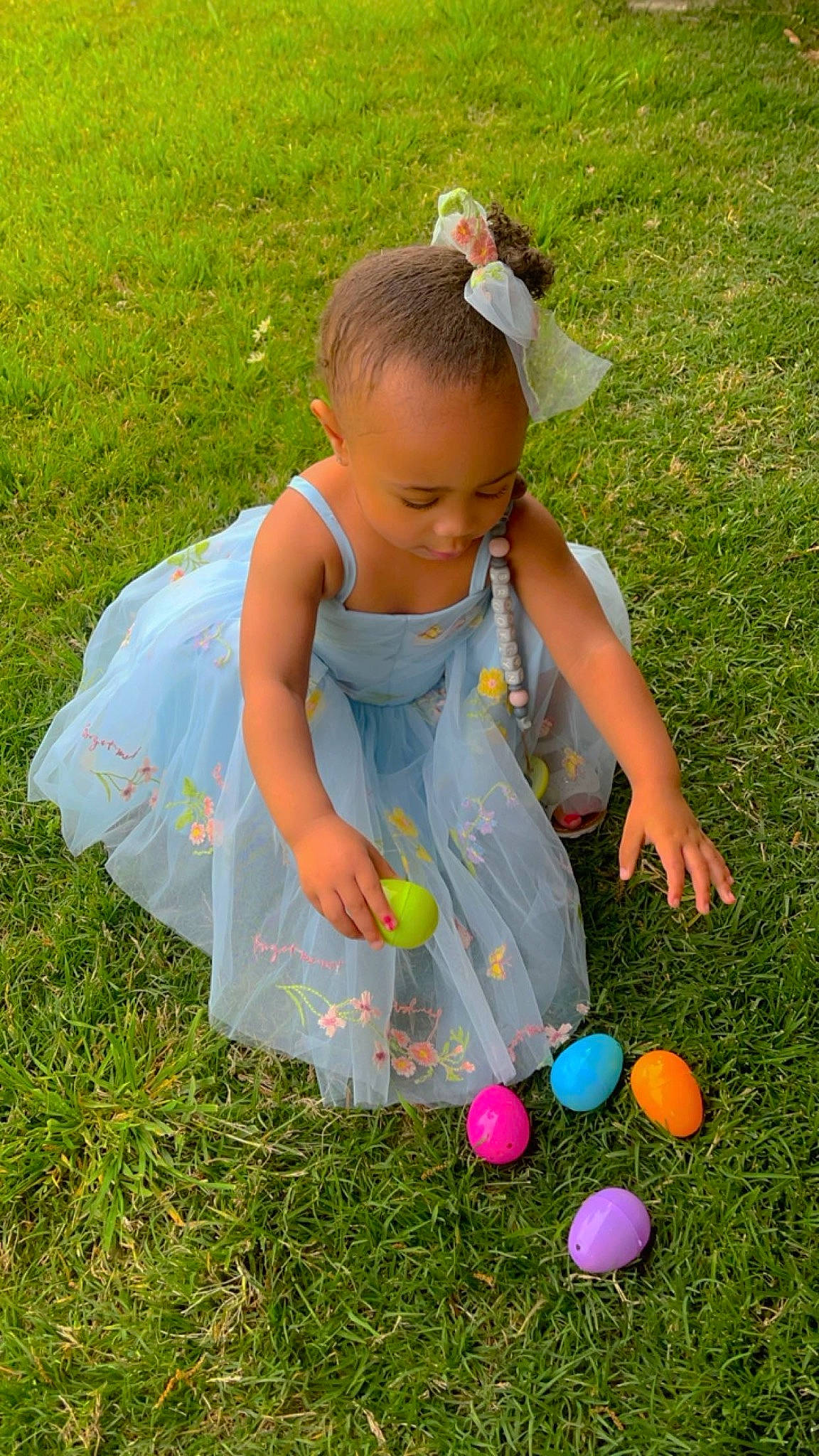 Brooklyn is registered to the contest to win money with this photo: baby_toddler_clothing, beauty, child, dress, event, fun, grass, grass_family, grassland, happy, lawn, leaf, leisure, nature, people, people_in_nature, person, photograph, recreation, summer