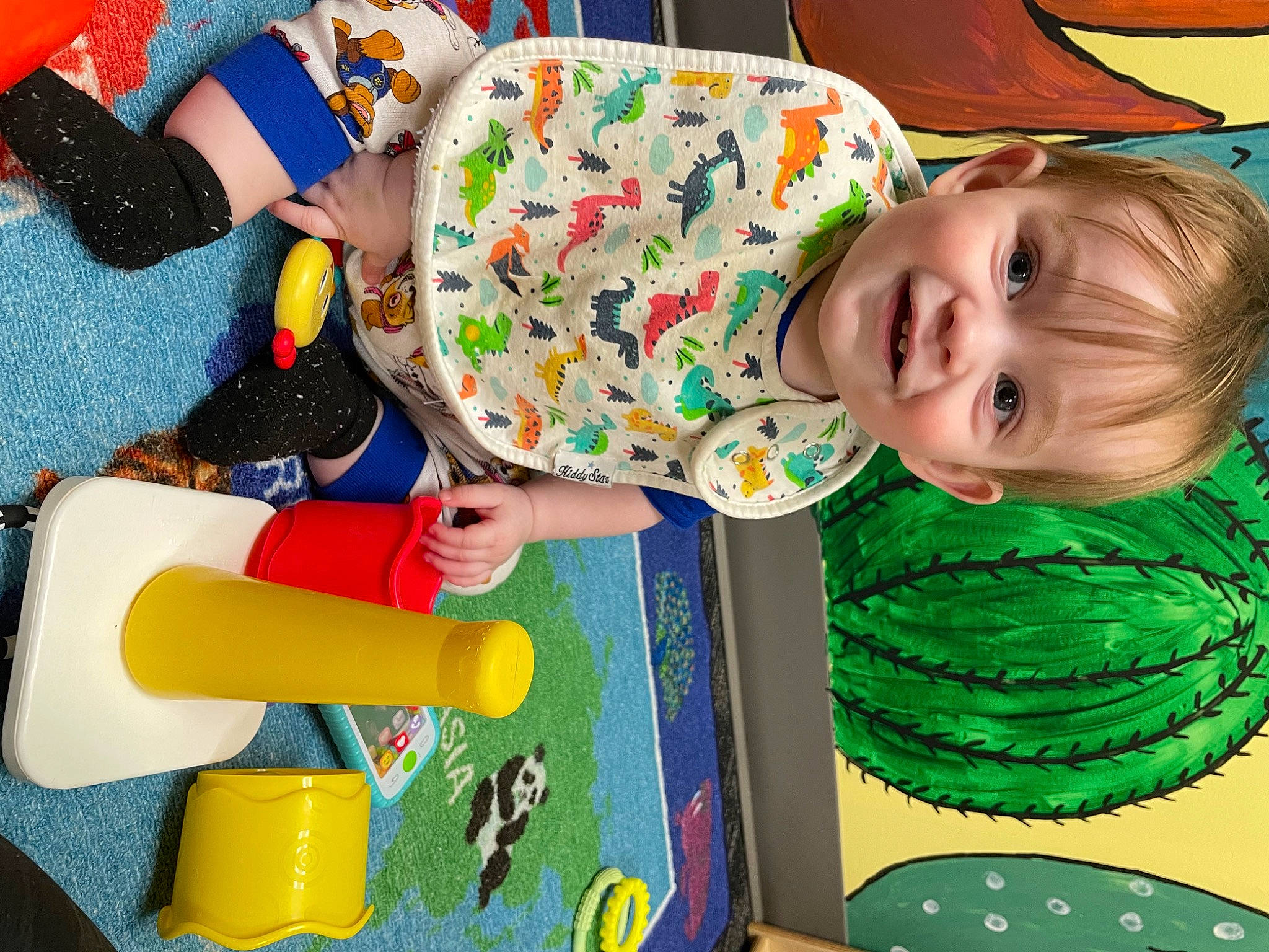 Karter is registered to the contest to win money with this photo: baby, baby_playing_with_toys, baby_products, baby_toddler_clothing, baby_toys, child, event, fun, green, happy, joy, leisure, pattern, person, plastic, play, room, smile, textile, toddler