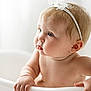 baby, infant, toddler, child, bathtub, bath, headband, white, skin, hand, face, earring, blue_eyes, portrait, cute, soft_light, water_drops, expression, indoors, closeup