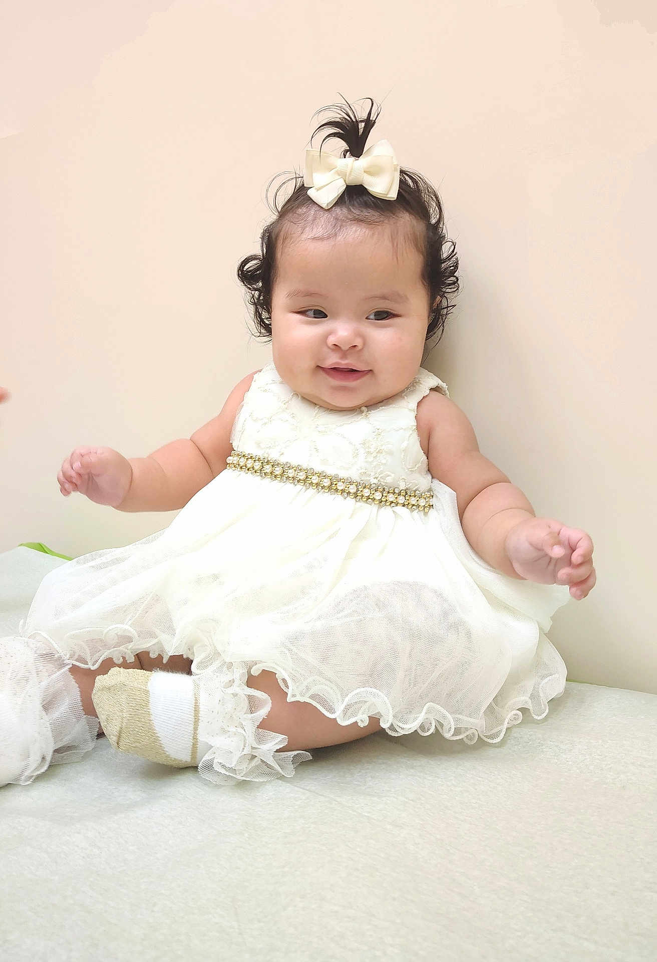 Luna joined the competition — help win amazing prizes! baby, child, dress, white_dress, bow, ponytail, cute, smiling, sitting, indoors, sock, baby_socks, adorable, chubby_cheeks, portrait, happy, young_child, fashion, elegant, infant