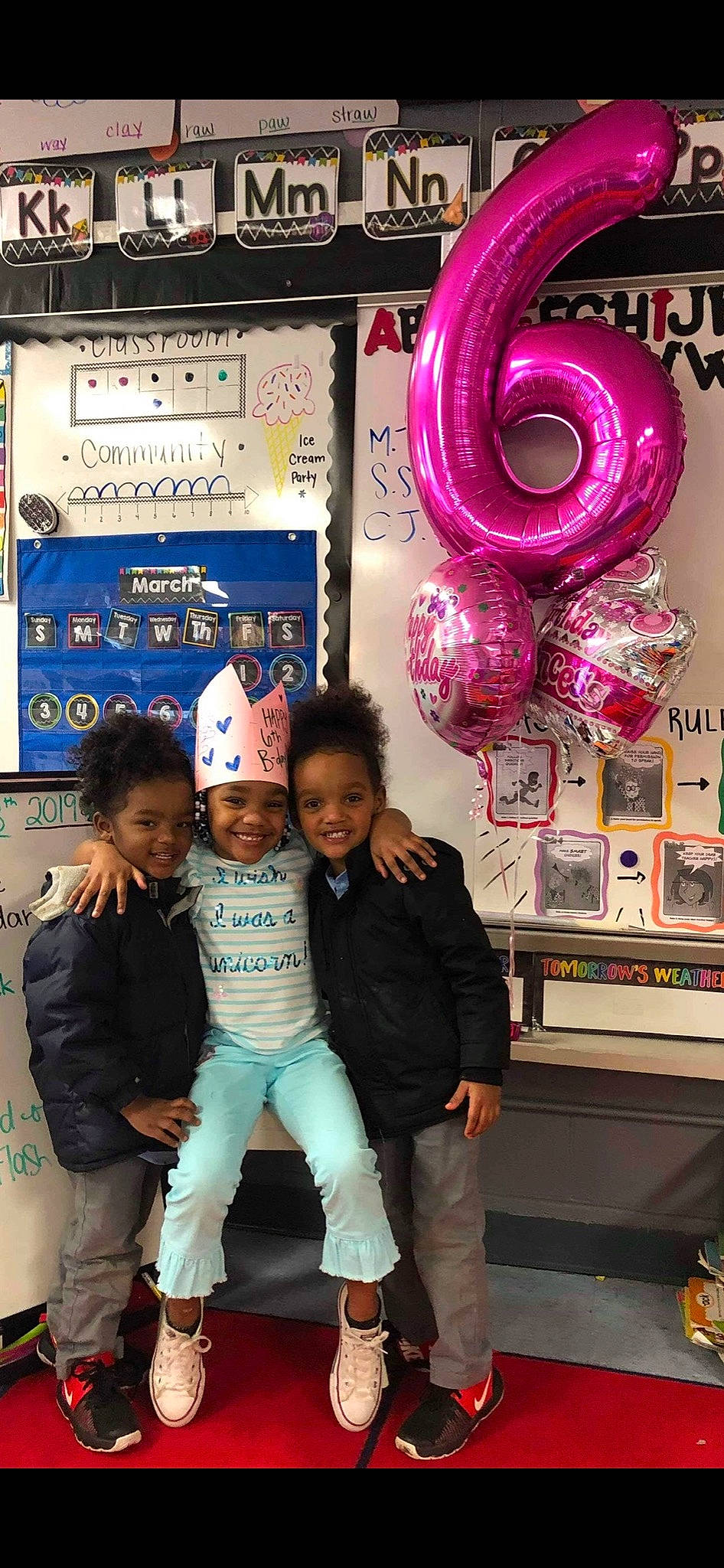 Raleigh is registered to the contest to win money with this photo: child, cool, event, fun, hairstyle, happy, headwear, human, human_body, joy, leisure, machine, magenta, organ, person, photograph, pink, smile, snapshot, t_shirt