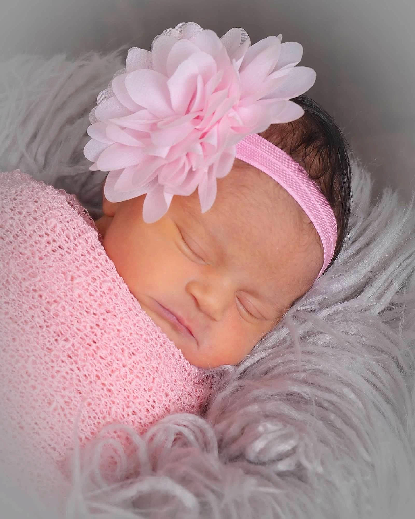 Bria joined the competition — help win amazing prizes! baby, baby_sleeping, baby_toddler_clothing, beauty, cap, comfort, eyebrow, eyelash, flower, hand, head, headband, headgear, headpiece, headwear, magenta, person, petal, pink, textile