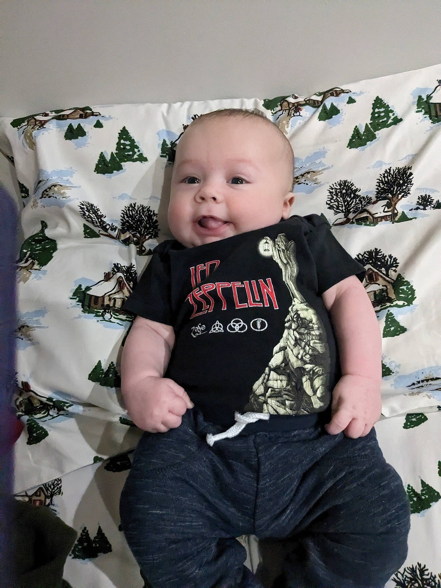 Christos is registered to the contest to win money with this photo: baby, baby_toddler_clothing, child, flash_photography, fun, hairstyle, happy, linens, magenta, monochrome, monochrome_photography, pattern, person, pink, portrait_photography, sitting, sleeve, smile, t_shirt, thigh