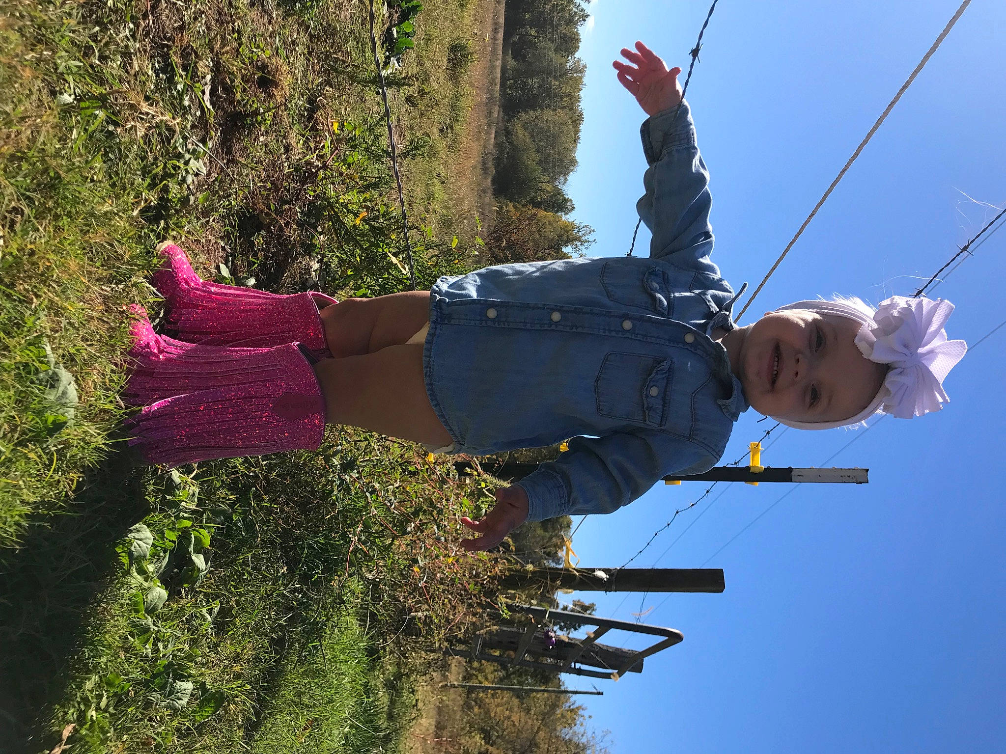 Jodee joined the competition — help win amazing prizes! branch, electrical_supply, electricity, fun, grass, happy, joy, leisure, line, people_in_nature, person, plant, pole, public_utility, rope, shrub, sky, smile, travel, tree