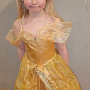 Lena participe au concours pour gagner de l'argent avec cette photo : child, girl, princess, dress, tiara, blonde_hair, portrait, indoor, wall, earrings, costume, full_length, pose, smile, eyes, person, floor, fabric, sparkle, cute