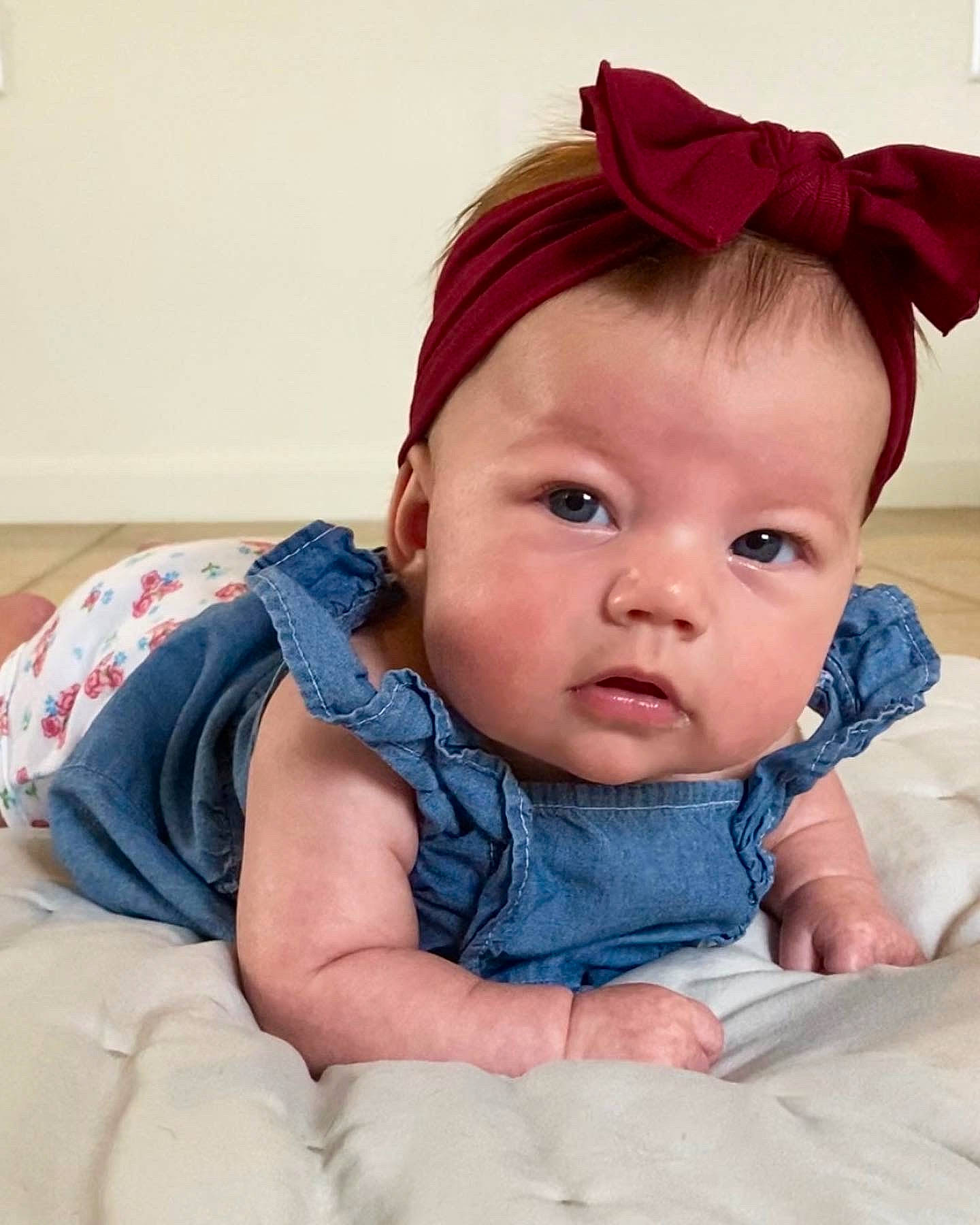 Piper is registered to the contest to win money with this photo: baby, baby_toddler_clothing, cheek, chin, comfort, ear, eye, eyebrow, eyelash, face, happy, head, iris, lip, mouth, neck, nose, outerwear, person, skin