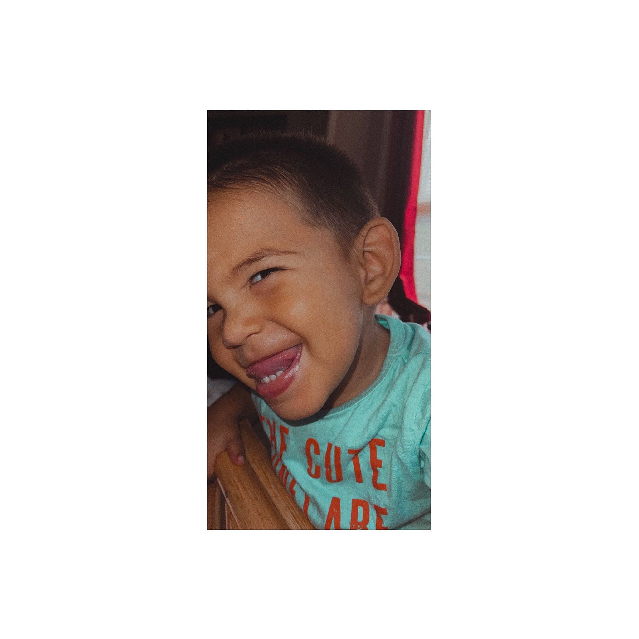 Kaisen Wayne is registered to the contest to win money with this photo: baby, child, eyelash, fashion_accessory, font, happy, jaw, joy, laugh, metal, person, photo_caption, plant, portrait_photography, shirt, sitting, sky, sleeve, smile, t_shirt