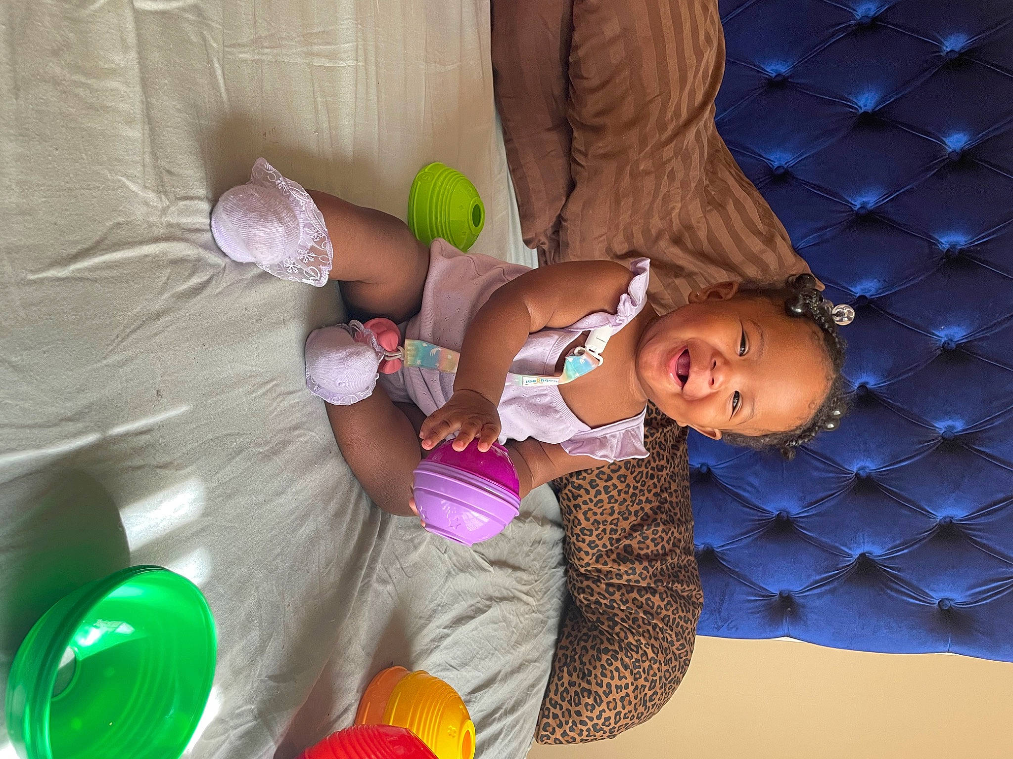 Alaia joined the competition — help win amazing prizes! baby, baby_toddler_clothing, baby_toys, child, comfort, finger, fun, green, happy, leisure, party_supply, person, play, purple, room, sitting, textile, thigh, toddler, toy