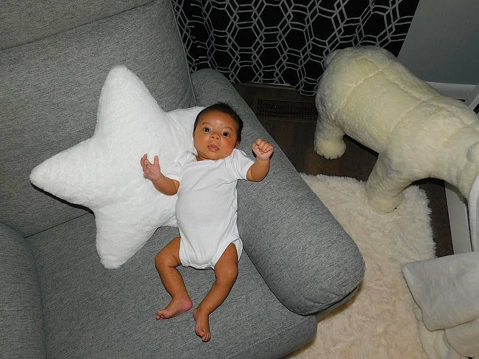 Legend joined the competition — help win amazing prizes! baby, baby_toddler_clothing, barefoot, bedding, child, comfort, flooring, foot, fun, linens, machine, mammal, person, product, room, sitting, stuffed_toy, textile, throw_pillow, toddler