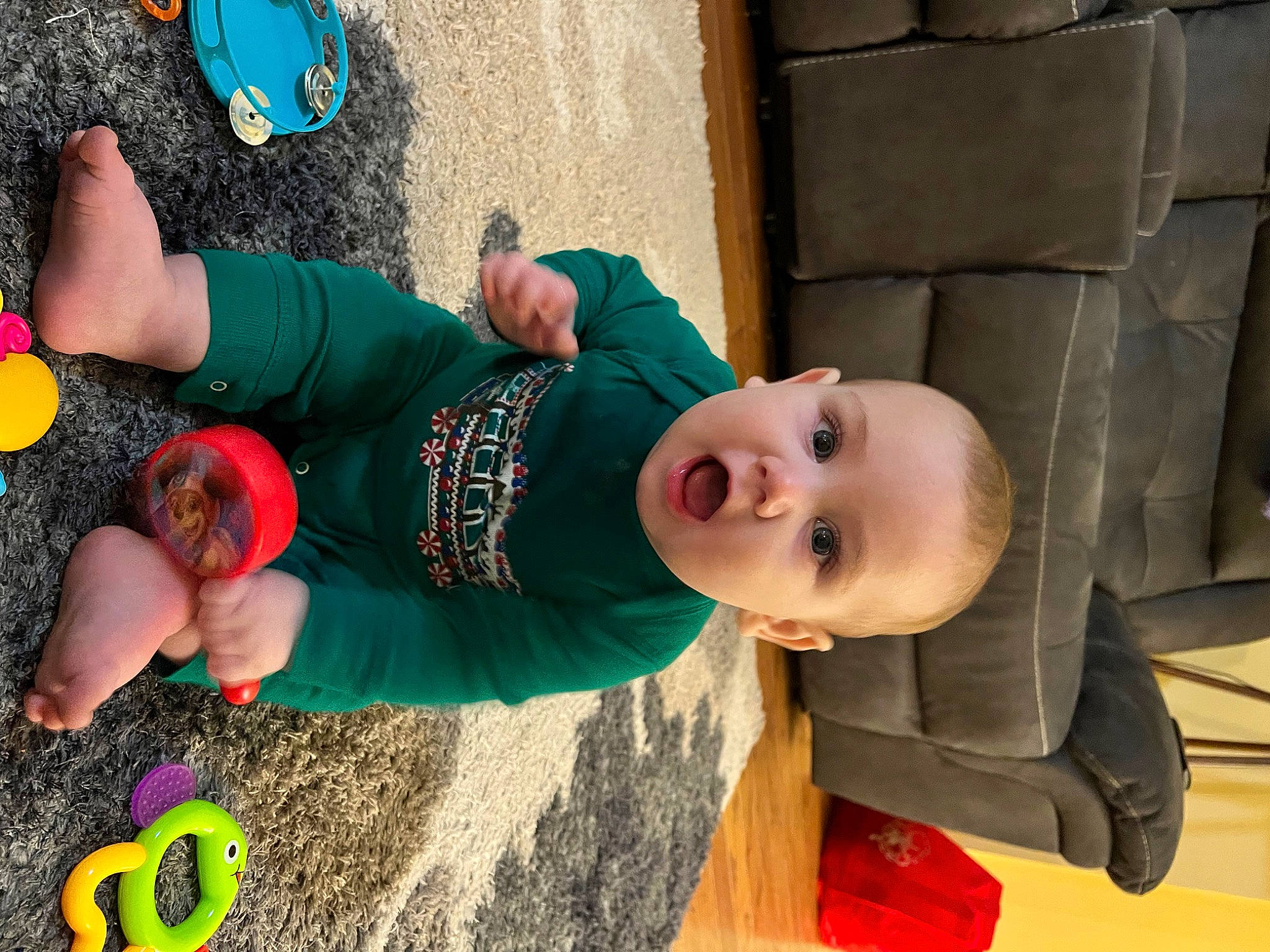 Reid is registered to the contest to win money with this photo: baby, child, fun, grass, happy, hat, leisure, logo, person, play, recreation, smile, soil, surprise, t_shirt, toddler, yellow