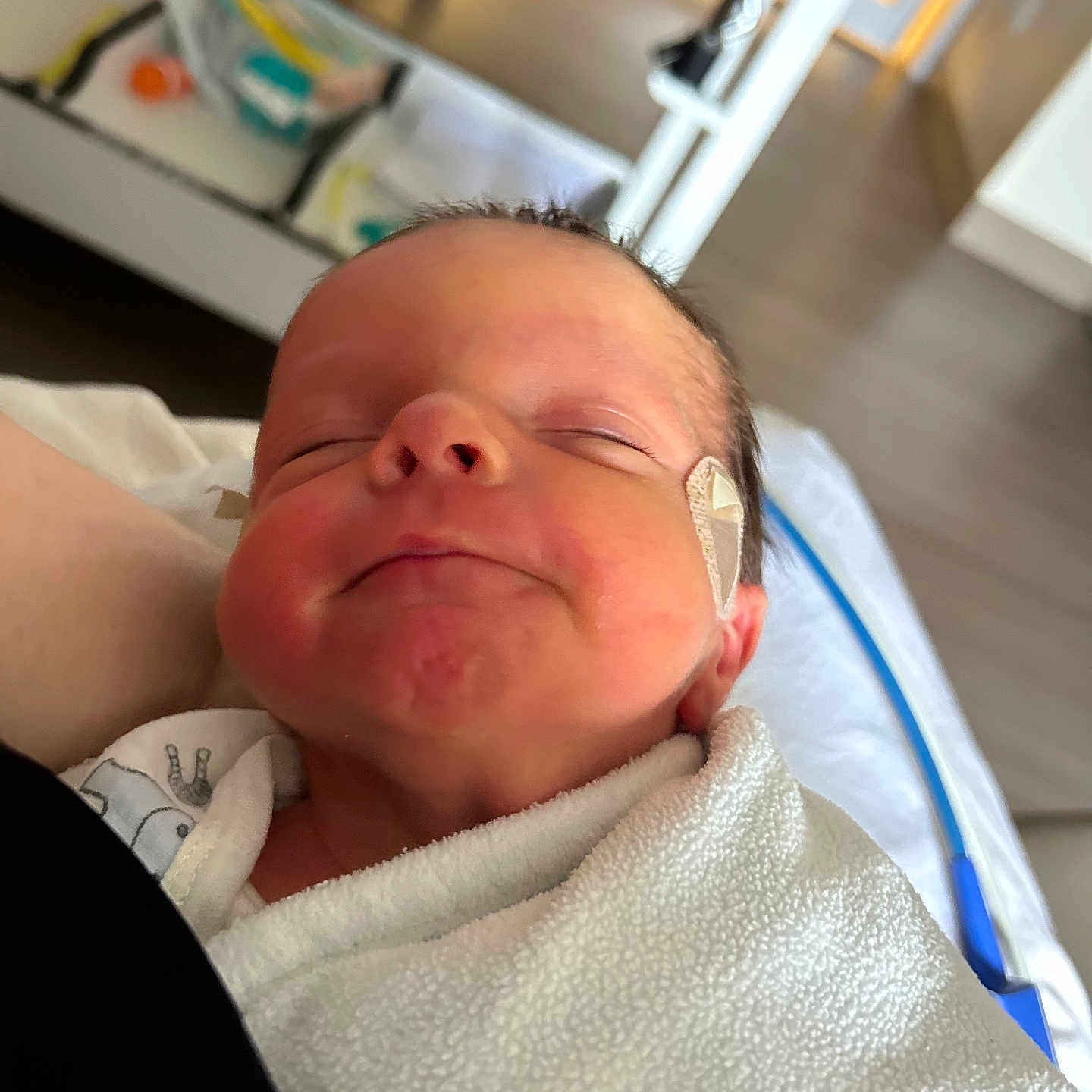 Jese is registered to the contest to win money with this photo: architecture, baby, bed, blanket, bodypart, building, cushion, face, finger, furniture, hand, head, homedecor, hospital, newborn, person, photography, portrait, sleeping, towel