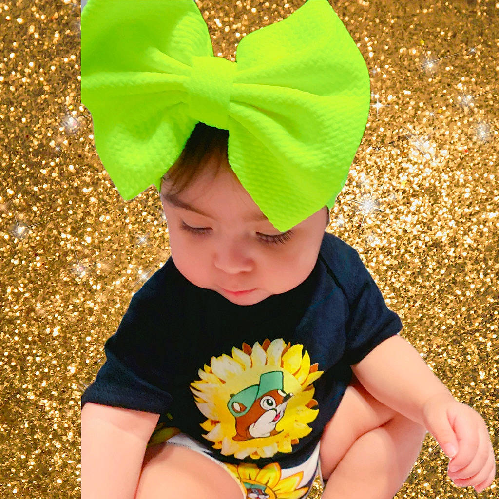 Avarose is registered to the contest to win money with this photo: baby, baby_toddler_clothing, cap, child, clothing, costume_hat, face, facial_expression, fun, grass, happy, head, headwear, orange, party_supply, people, person, red, sleeve, summer