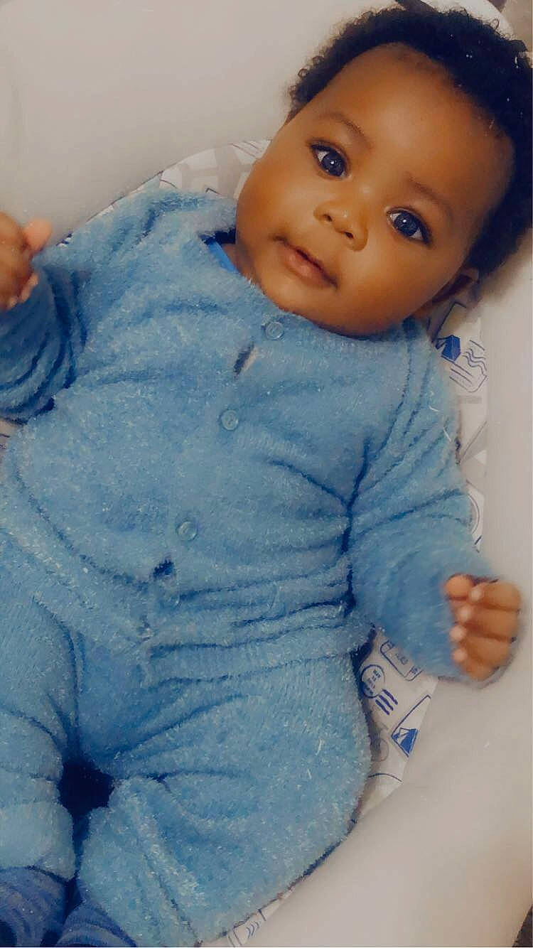 Patrick Smith Jr is registered to the contest to win money with this photo: arm, baby_toddler_clothing, cheek, child, chin, comfort, eye, eyelash, face, facial_expression, forehead, head, iris, lip, mouth, nose, person, skin, sleeve, toddler