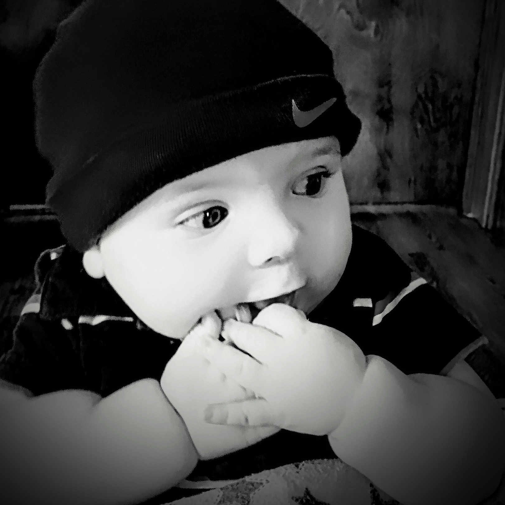 Armani is registered to the contest to win money with this photo: art, baby, black, black_and_white, black_hair, cap, darkness, eye, eyebrow, fashion_accessory, flash_photography, happy, hat, headgear, human_body, lip, monochrome, monochrome_photography, style, toddler