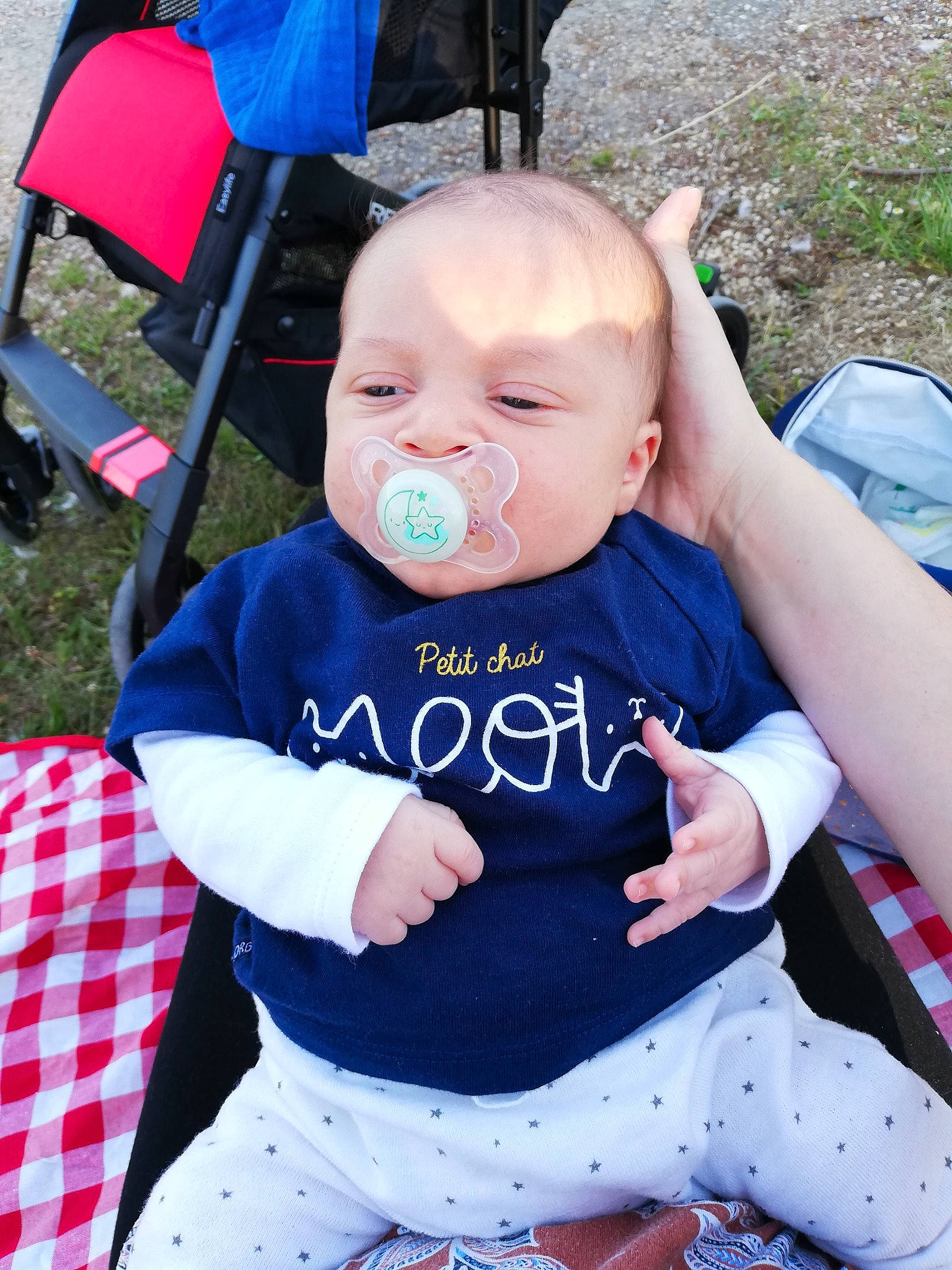 Samaël participe au concours pour gagner de l'argent avec cette photo : baby, baby_carriage, baby_products, baby_toddler_clothing, child, pattern, person, product, toddler