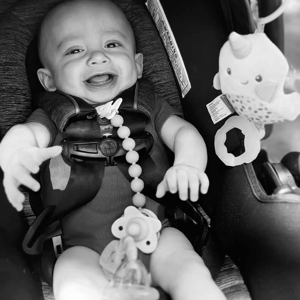 Kainoa joined the competition — help win amazing prizes! accessories, baby, bodypart, clothing, coat, face, finger, hand, happy, hat, head, jacket, jewelry, laughing, necklace, person, photography, portrait, smile, stroller