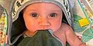 Bryton joined the competition — help win amazing prizes! baby, big_eyes, biting_towel, blanket, bouncer, cheeks, close_up, curious_gaze, cute, dinosaur_print, hands, hooded_towel, infant, patterned_fabric, portrait, seat, skin, soft_lighting, towel, toy