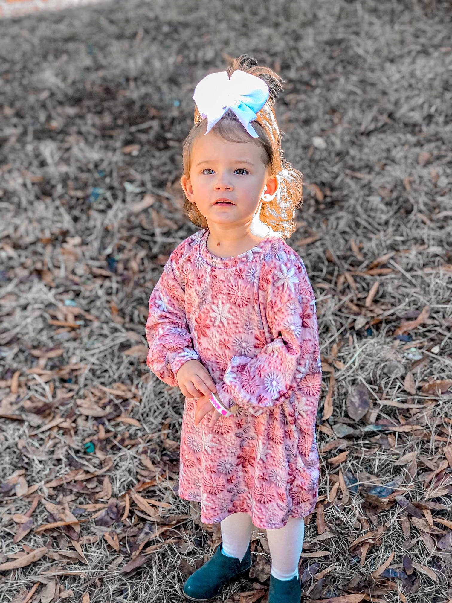 Laken is registered to the contest to win money with this photo: baby, baby_toddler_clothing, boot, clothing, eye, fun, grass, happy, iris, magenta, pattern, people_in_nature, person, plant, portrait_photography, sitting, sleeve, soil, toddler, tree