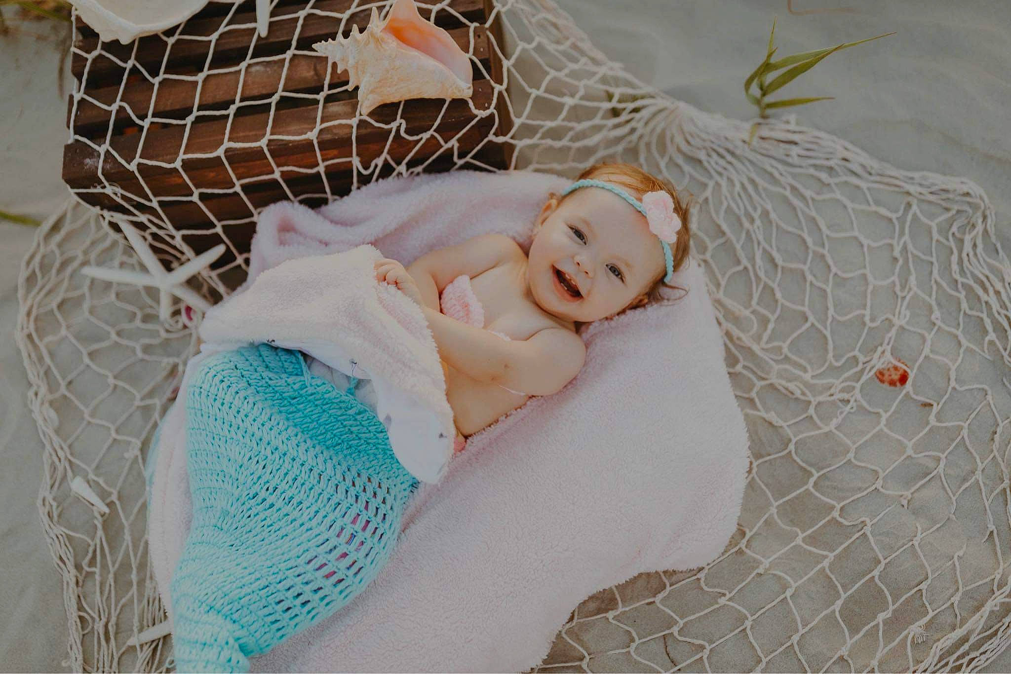 Aria is registered to the contest to win money with this photo: baby, baby_products, baby_safety, baby_toddler_clothing, bed, bedding, bedtime, comfort, fun, happy, headwear, infant_bed, leisure, linens, mesh, net, pattern, person, smile, textile