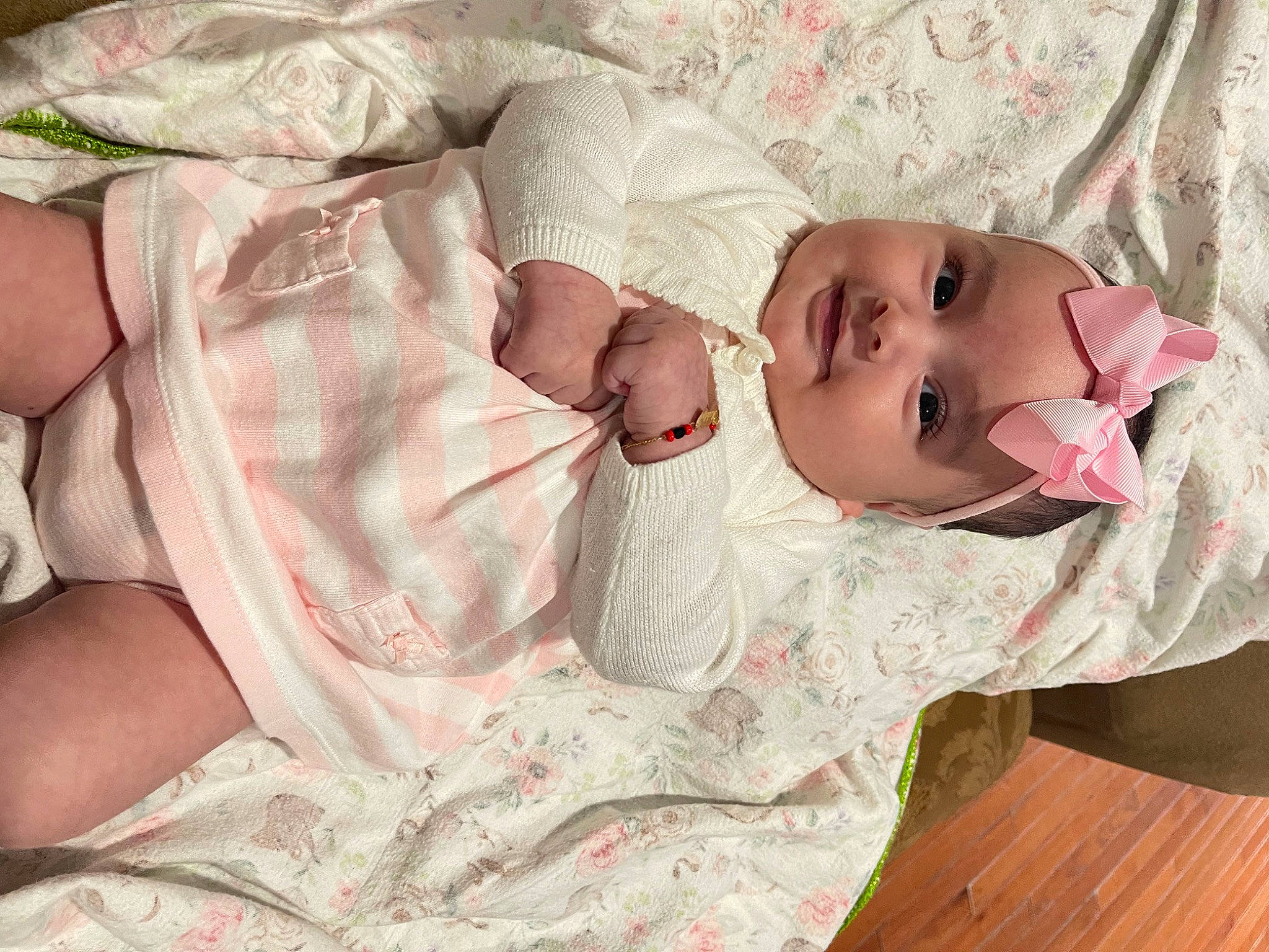 Madeline joined the competition — help win amazing prizes! baby, baby_products, baby_toddler_clothing, cheek, child, comfort, eye, eyebrow, eyelash, head, headwear, human_body, iris, joy, linens, lip, pattern, person, pink, skin