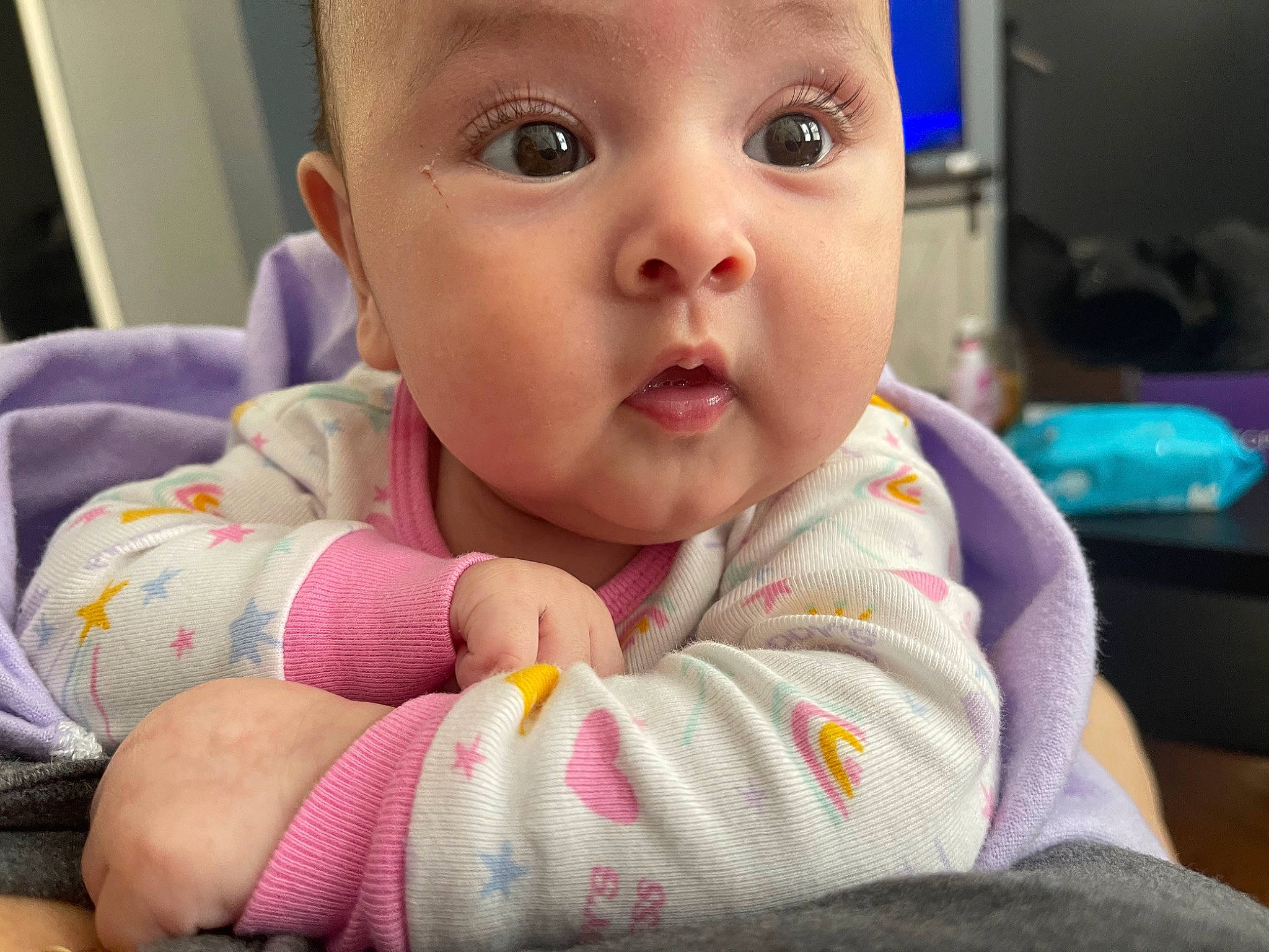 Madeline joined the competition — help win amazing prizes! baby, baby_toddler_clothing, cheek, child, comfort, eyelash, face, flooring, fun, gesture, happy, headwear, iris, linens, nose, people, person, room, sitting, skin
