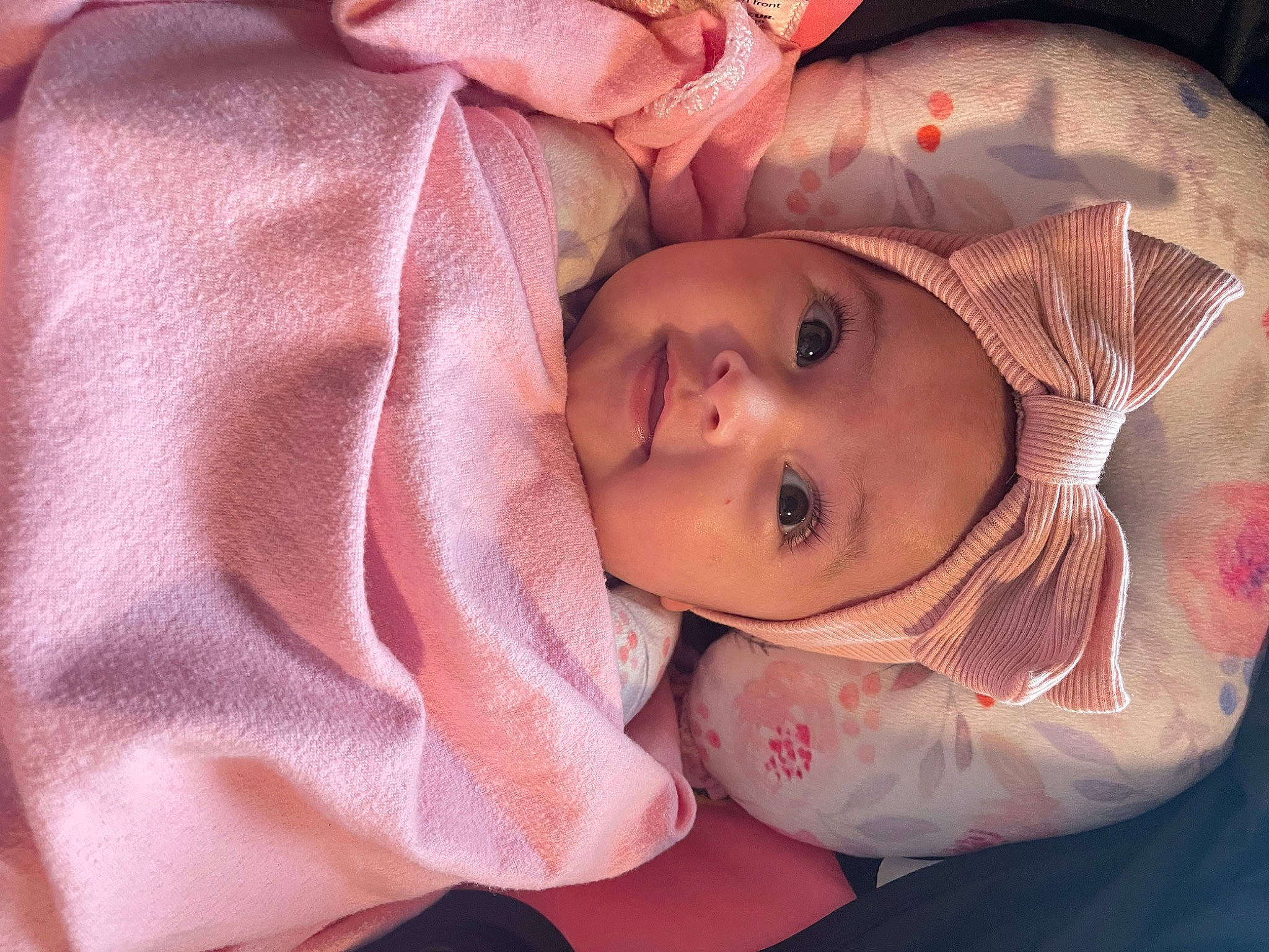 Madeline joined the competition — help win amazing prizes! baby, baby_toddler_clothing, cheek, chin, ear, eye, eyebrow, eyelash, face, head, headgear, headwear, human_body, iris, lip, mouth, nose, person, pink, product