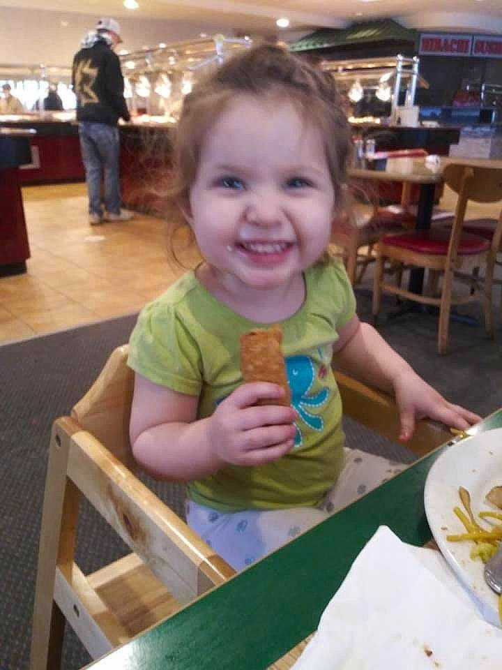 Cadence is registered to the contest to win money with this photo: baby, chair, child, dishware, event, flooring, fun, furniture, happy, joy, leisure, person, plate, recreation, skin, smile, t_shirt, table, tableware, thumb