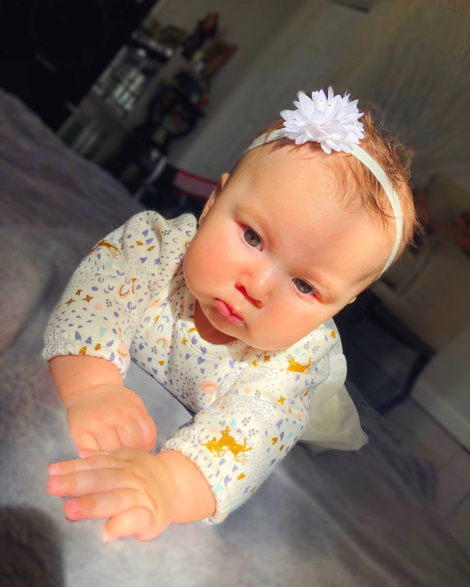 Malayna joined the competition — help win amazing prizes! baby, baby_toddler_clothing, child, ear, fashion_accessory, hair_accessory, head, headband, headgear, headpiece, person, skin, toddler, yellow