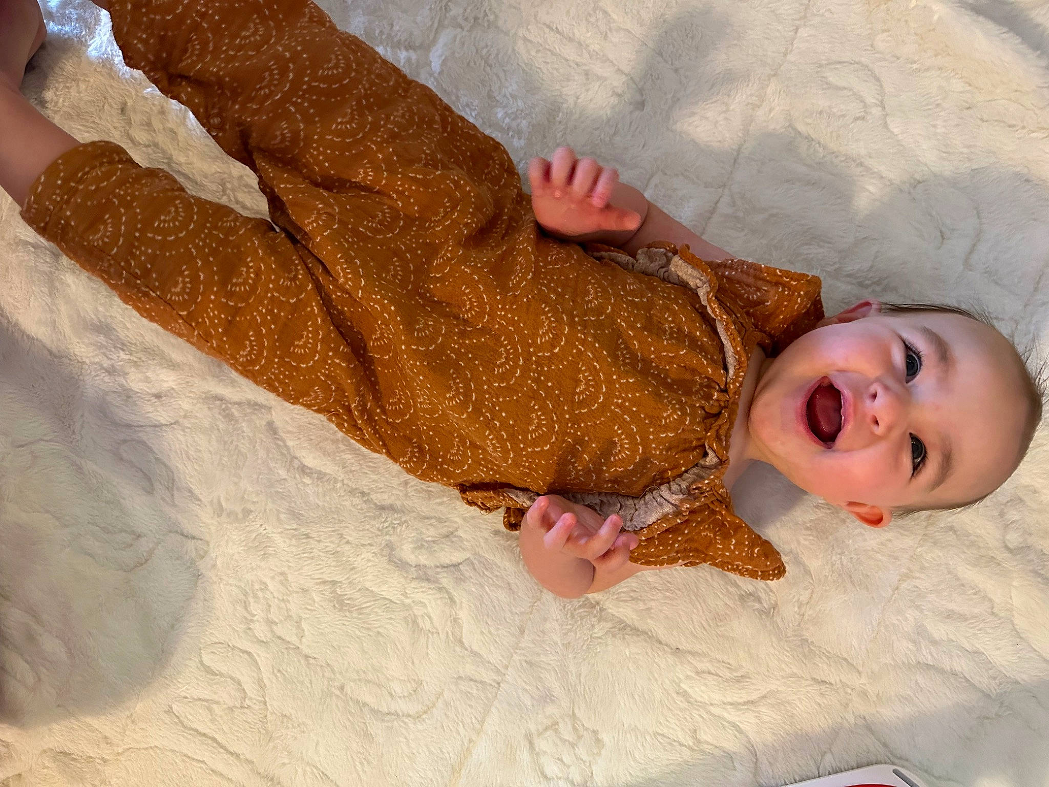 Charlotte joined the competition — help win amazing prizes! arm, baby, baby_toddler_clothing, child, comfort, fawn, finger, flooring, fun, gesture, happy, human_body, linens, pattern, person, skin, sleeve, smile, toddler, wood
