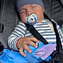 Eric is registered to the contest to win money with this photo: baby, child, sleeping, pacifier, plush_toy, blue_hat, striped_shirt, car_seat, seatbelt, hand, soft_toy, infant, resting, cute, childhood, peaceful, cozy, indoor, person, closeup