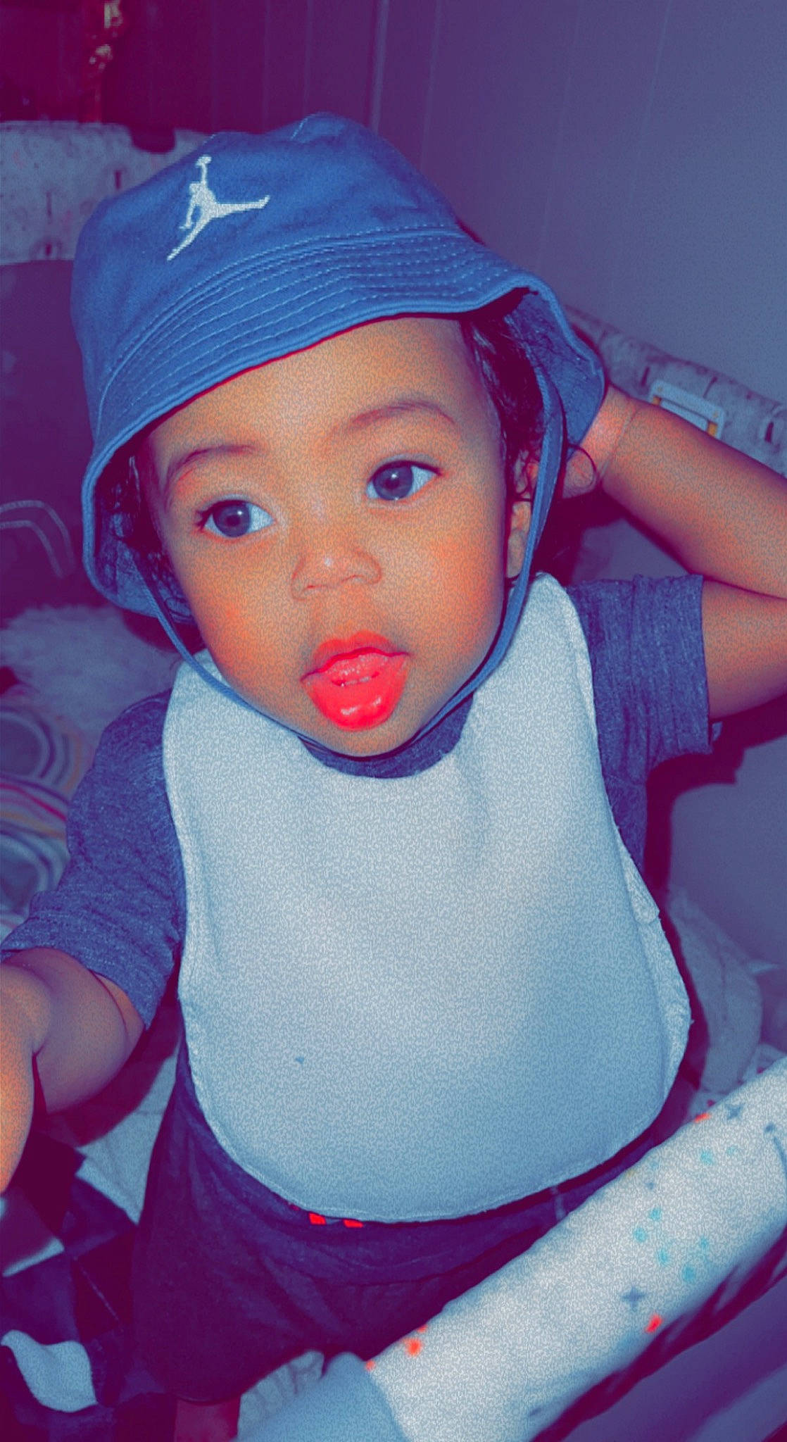 Jamier joined the competition — help win amazing prizes! arm, azure, baby, baby_toddler_clothing, baseball_cap, cap, cheek, cool, facial_expression, headwear, iris, lip, mouth, nose, organ, person, pink, product, purple, skin