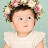 Asiya joined the competition — help win amazing prizes! baby, child, infant, portrait, flower_crown, flowers, roses, floral, dress, cream_clothing, pastel_background, indoor, studio, close_up, face, eyes, looking_up, sitting, adorable, photography