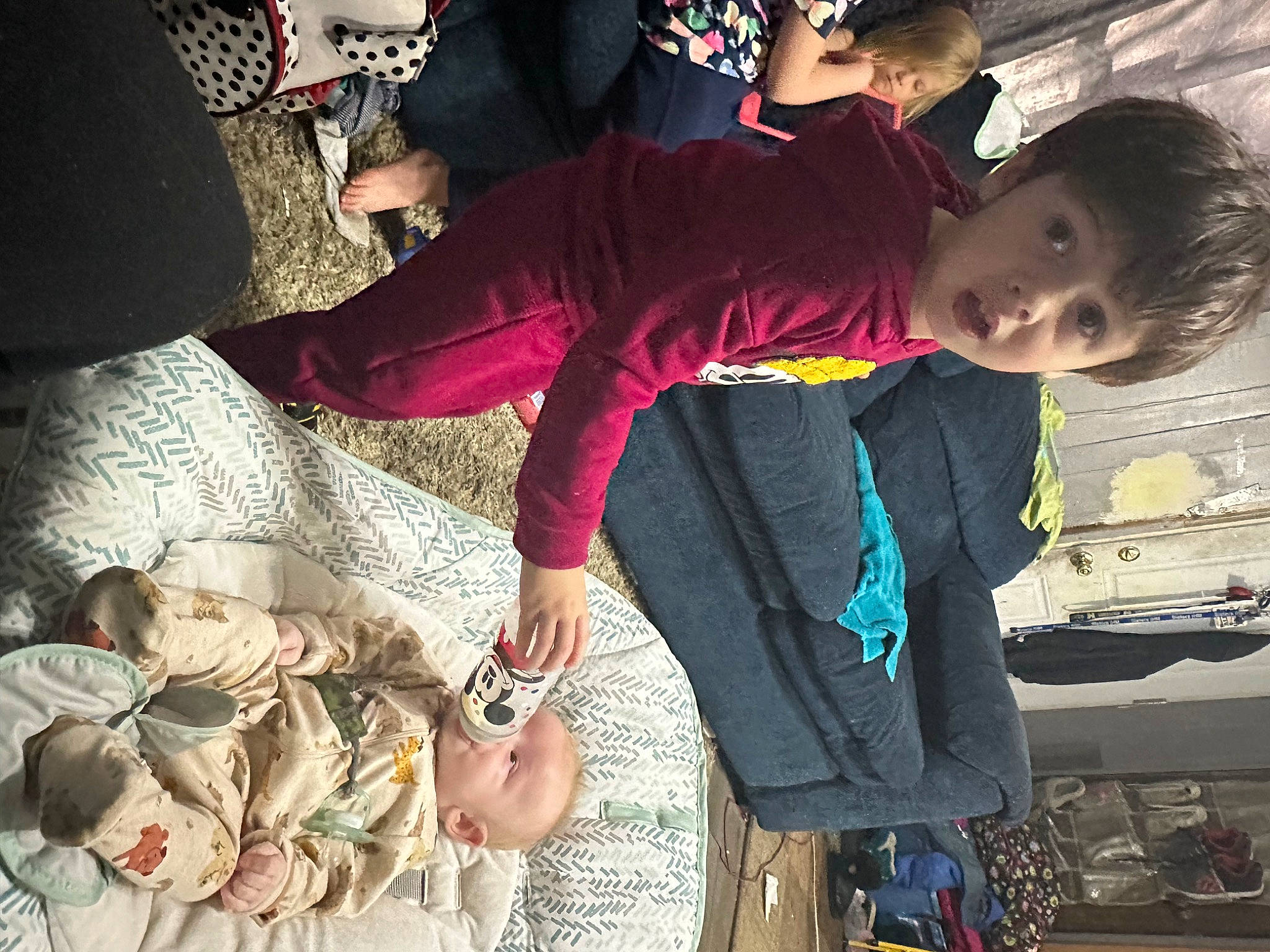 Robert is registered to the contest to win money with this photo: bag, child, cool, event, formal_wear, fun, gesture, hand, happy, love, luggage_and_bags, magenta, person, pink, plant, rose, sitting, surprise, temple, toddler