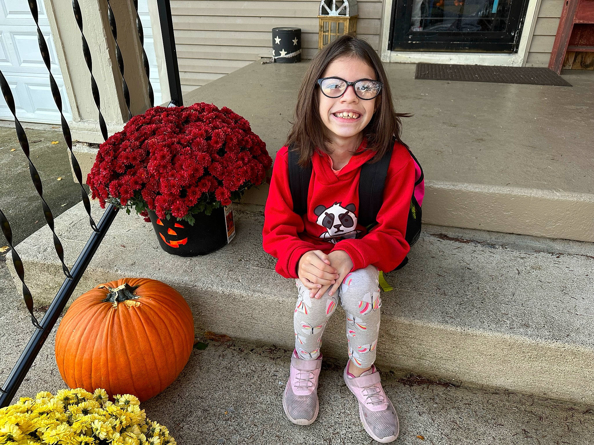 Miracle joined the competition — help win amazing prizes! calabaza, cucurbita, eyewear, floristry, flower, flower_arranging, glasses, gourd, grass, joy, magenta, natural_foods, orange, organ, person, plant, pumpkin, sitting, smile, squash