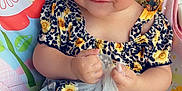 Ashanti joined the competition — help win amazing prizes! baby, bodypart, clothing, cushion, cutlery, dress, face, finger, furniture, hand, happy, head, homedecor, person, photography, portrait, shorts, sitting, smile, spoon