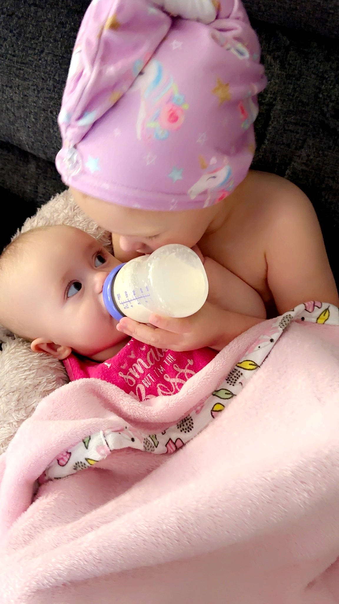 Georgia is registered to the contest to win money with this photo: baby, baby_bottle, baby_products, baby_toddler_clothing, cap, cheek, child, drinking, drinkware, fashion_accessory, happy, headgear, nail, pattern, person, pink, plastic_bottle, skin, sweetness, toddler