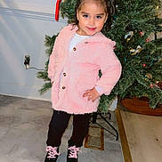 Victoria joined the competition — help win amazing prizes! child, girl, pink_jacket, black_pants, black_shoes, pink_shoelaces, bow, christmas_tree, holiday, indoor, pose, smile, floor, wall, decorations, festive, cute, fashion, young, happy