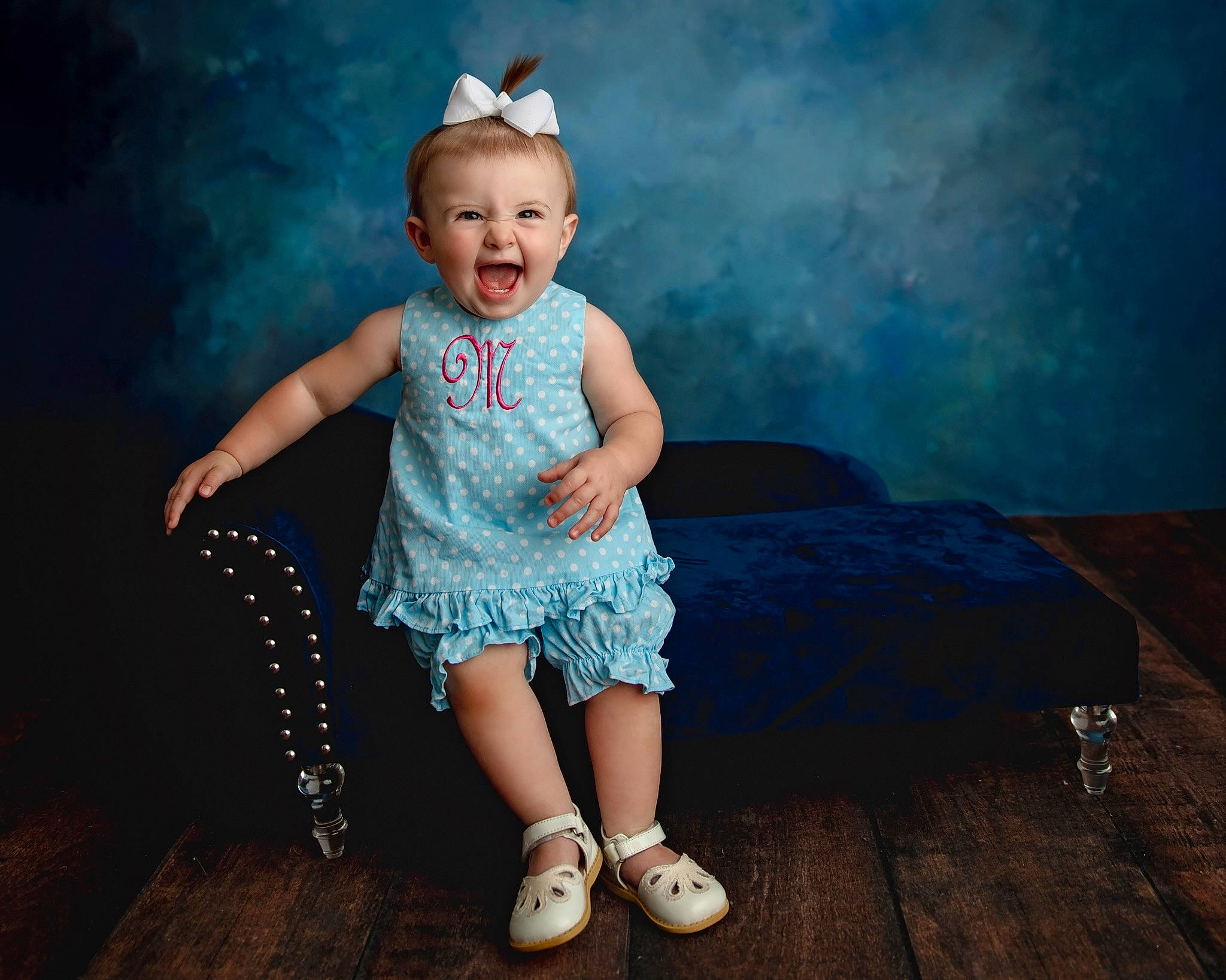 Maci is registered to the contest to win money with this photo: azure, baby, baby_toddler_clothing, blue, child, day_dress, electric_blue, fashion_accessory, flash_photography, fun, grass, happy, hat, magenta, pattern, person, pink, purple, smile, toddler