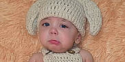 Orion joined the competition — help win amazing prizes! baby, blue_eyes, child, cozy, crocheted_hat, crocheted_outfit, cute, expression, hand, headwear, indoors, infant, knitwear, newborn, peach_color, portrait, pouty_face, skin, soft_blanket, young_child