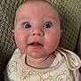 Elijah joined the competition — help win amazing prizes! baby, infant, face, eyes, bib, clothing, expression, curious, close_up, skin, cheeks, mouth, head, person, portrait, texture, background, cute, child, young