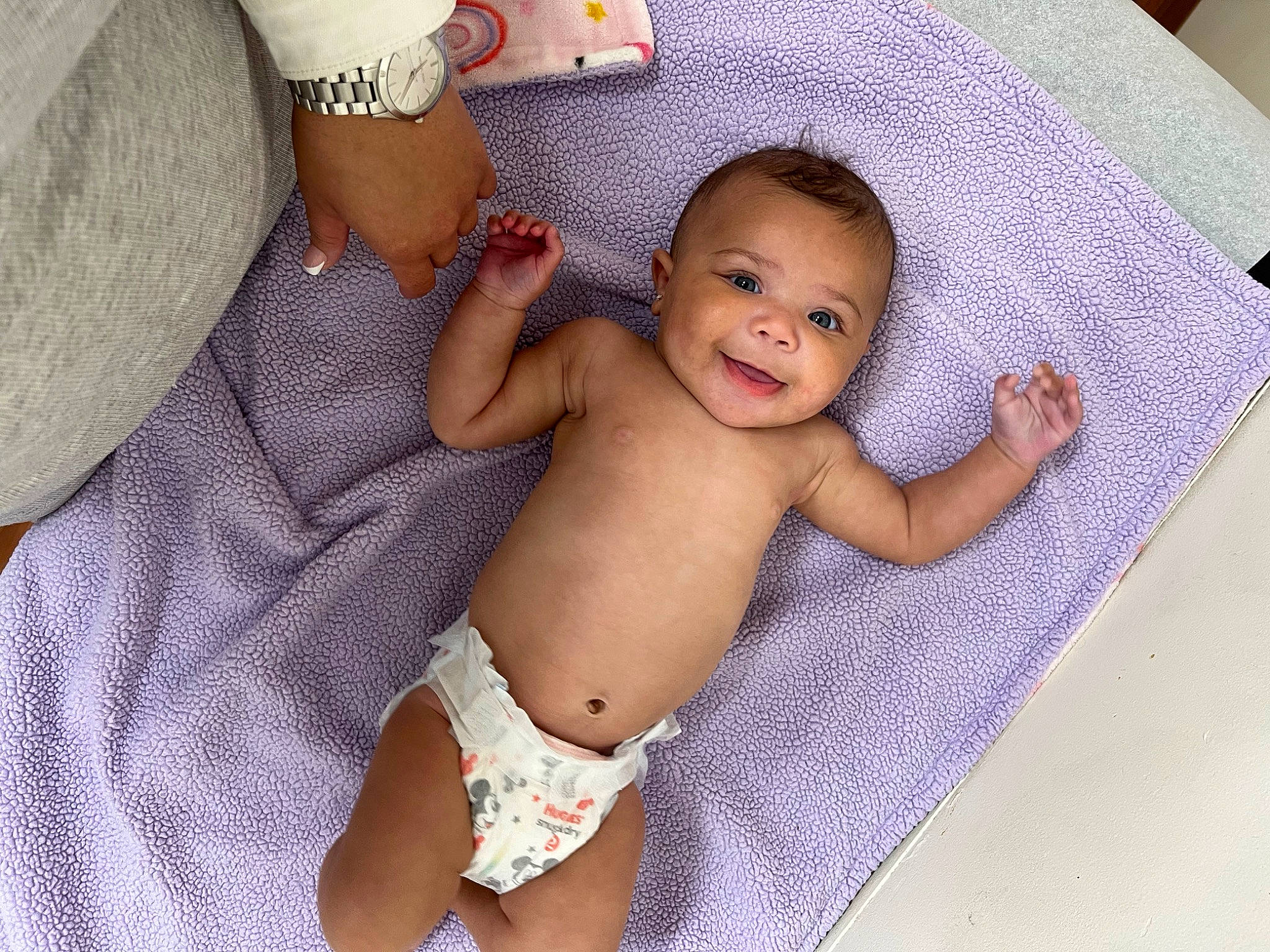 Emmy is registered to the contest to win money with this photo: abdomen, baby, baby_toddler_clothing, chest, comfort, eye, face, finger, happy, human_body, iris, person, pink, skin, smile, stomach, textile, thigh, thumb, toddler