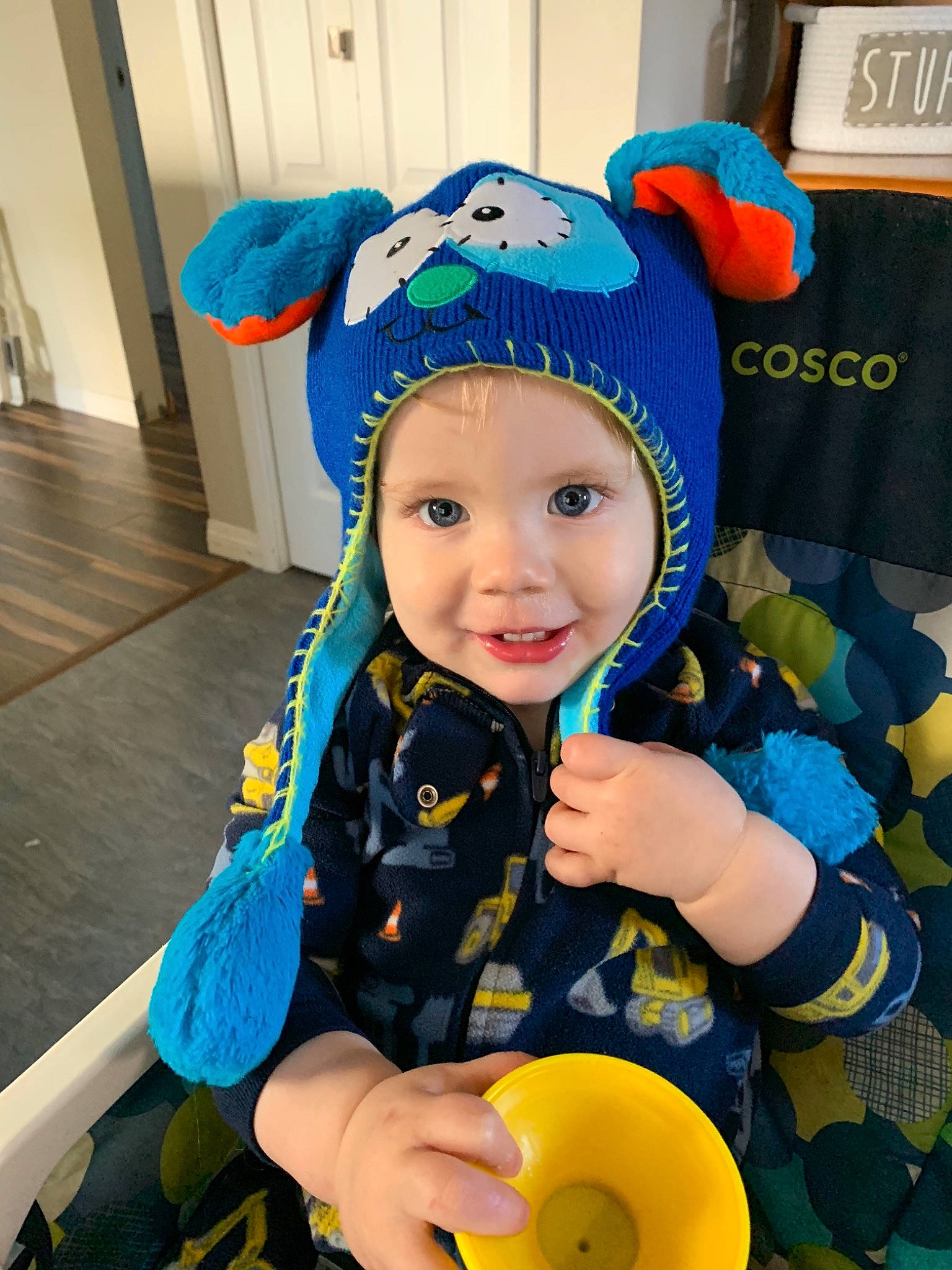 Kessler is registered to the contest to win money with this photo: baby, beanie, blue, bonnet, cap, child, costume, ear, eye, fashion_accessory, hat, head, headgear, helmet, joy, person, personal_protective_equipment, play, smile, toddler
