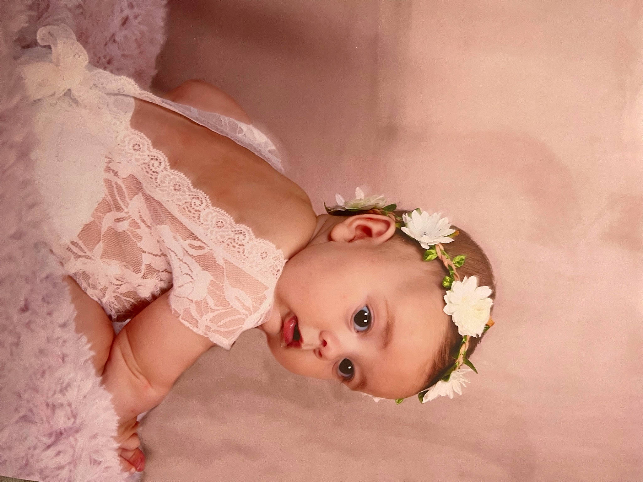 Victorya participe au concours pour gagner de l'argent avec cette photo : arm, baby, baby_toddler_clothing, clothing, dress, embellishment, eye, eyelash, flash_photography, hair, happy, headgear, headpiece, human_body, iris, lip, person, pink, plant, shoulder